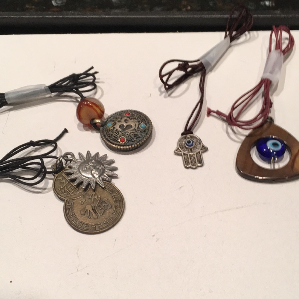 NWOT Set of Four Amulets